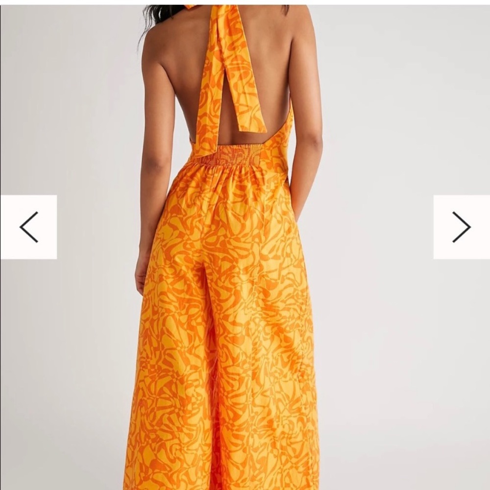 NWT  FREE PEOPLE SIZE L KIRA JUMPSUIT CUTOUT ONE PIECE